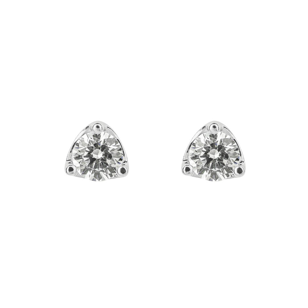 A pair of silver stud earrings with triangular prong settings holding clear round-cut gemstones, shown on a plain white background.