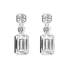 Pair of diamond earrings on a white background