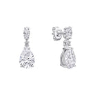 Pair of diamond earrings on a white background