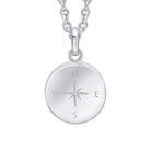 Silver necklace with a round pendant featuring a compass design on a white background