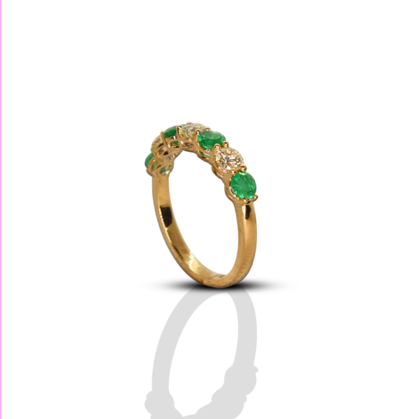 Emerald and diamond eternity ring